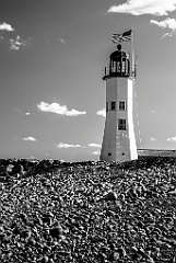 Scituate Lighhouse on Rocky Shore in Massachusetts -BW